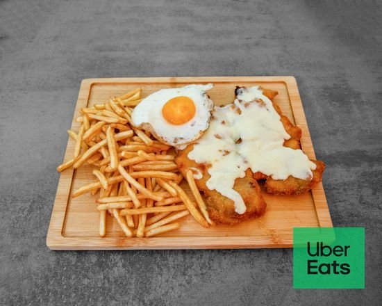 Milanesa de pollo especial con patatas